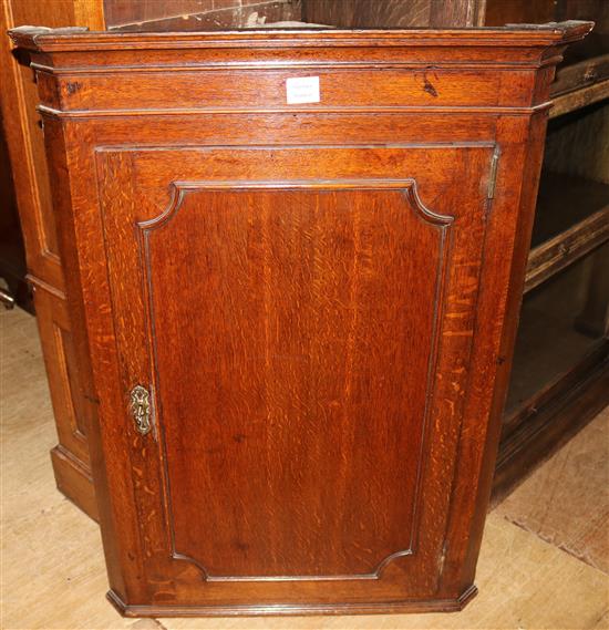 Late Georgian oak hanging corner cupboard